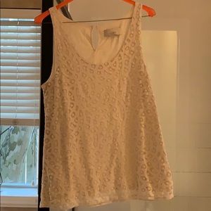 Lift cream colored sleeveless shirt